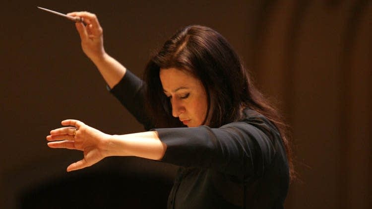 Woman waving baton