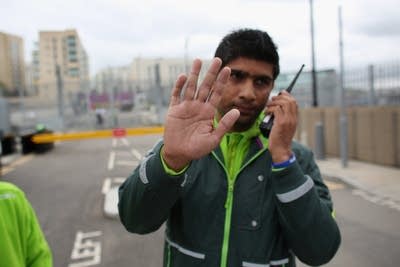 A security guard at the Olympic Park perimeter