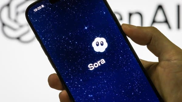 Smartphone with Sora 2 logo on the screen
