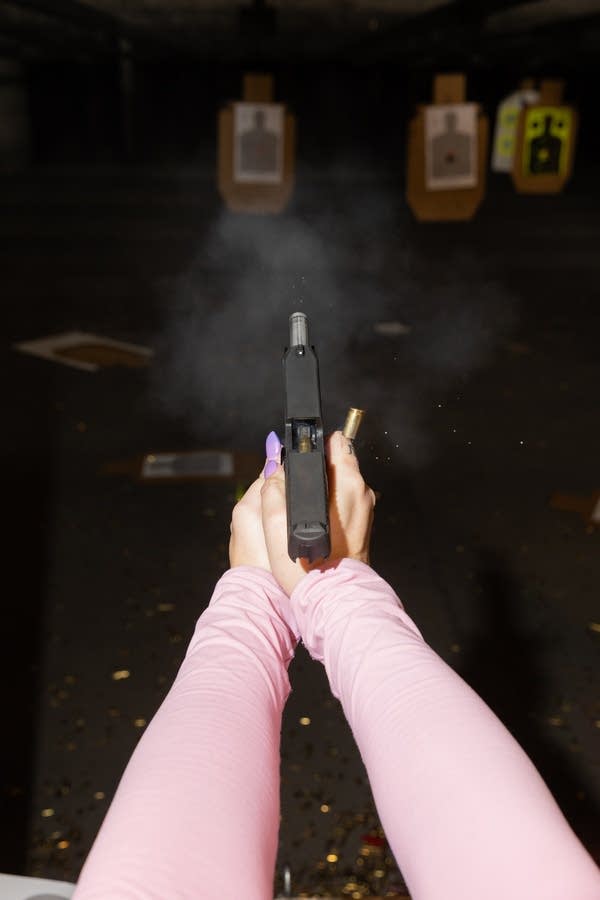A person fires a gun-1