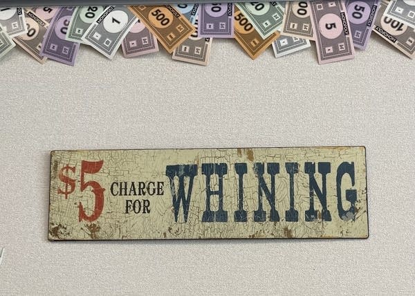A sign in Carrie Hixon's classroom where she teaches personal finance in Mustang, Oklahoma 