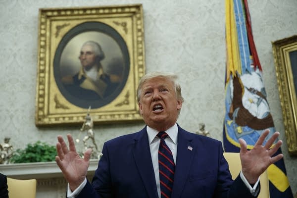 President Trump speaks during a meeting