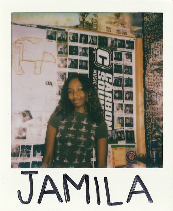 a woman posing for a polaroid photo