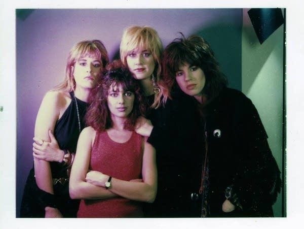 The Bangles in a Polaroid photo, circa 1986; left to right: Vicki Peterson, Susanna Hoffs, Debbi Peterson, Michael Steele.