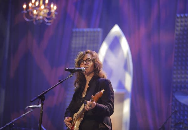 A musician performs onstage