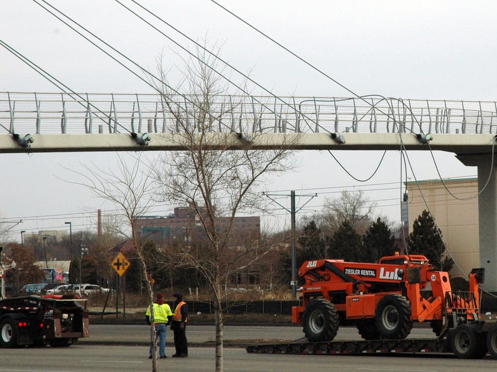 Workers at the Sabo bridge