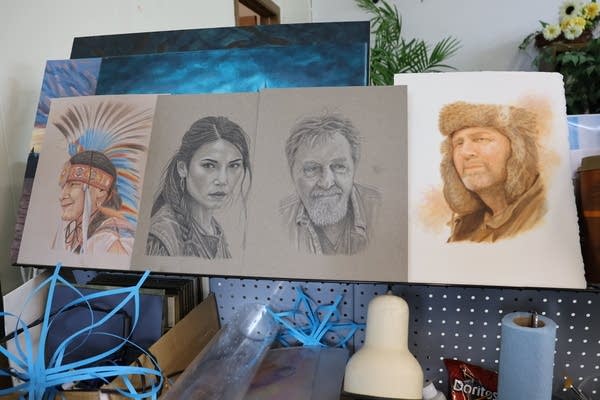 A lineup of four portraits illustrated in different media.