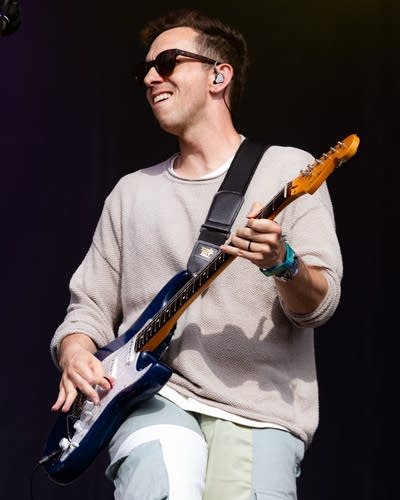 cory wong playing guitar on stage