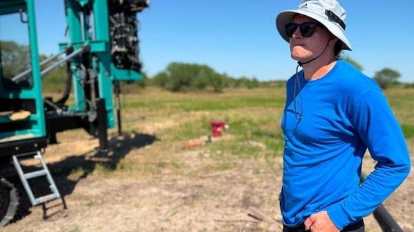 Geothermal driller Billy Baker, with Bedrock Energy, considers the company's specialized drill rig at a test site in Eagle Lake, Texas. Many geothermal drillers are recruited from the oil and gas industry. But a proliferation of geothermal projects on the horizon could outstrip the available skilled workforce. 