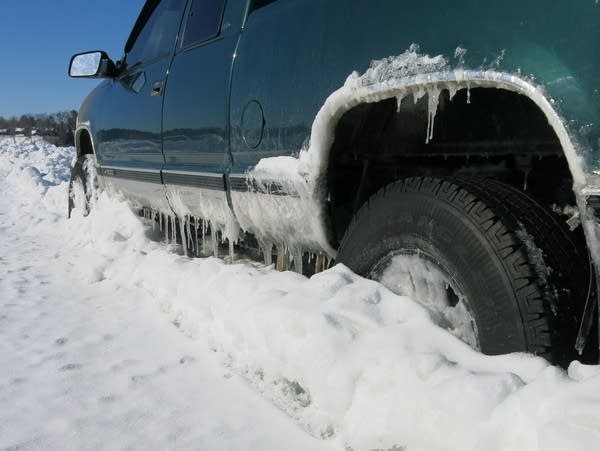 This truck is frozen in place on Leech Lake