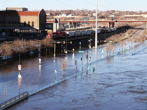 A stretch of Shepard and Warner roads in St. Paul is inundated