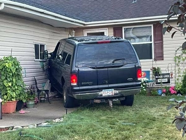 car crashing into a home