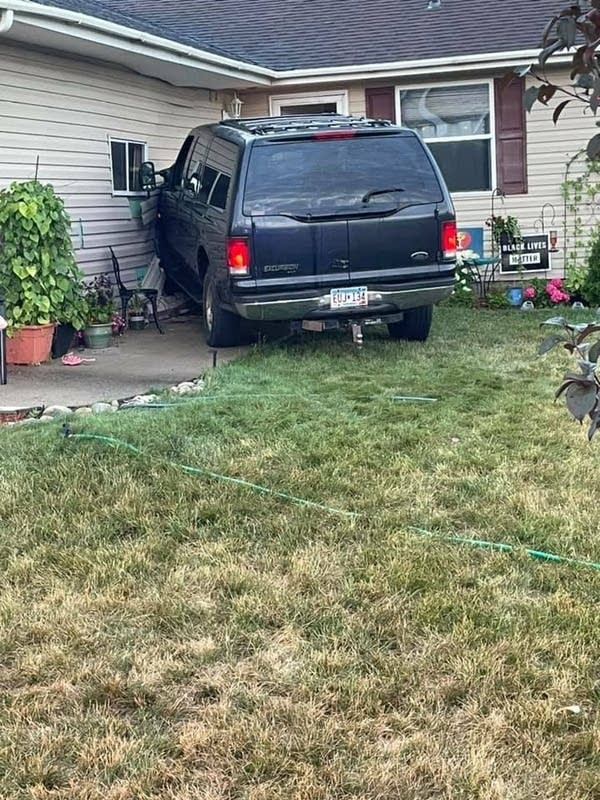 car crashing into a home