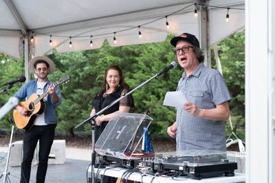 Bill DeVille introducing band