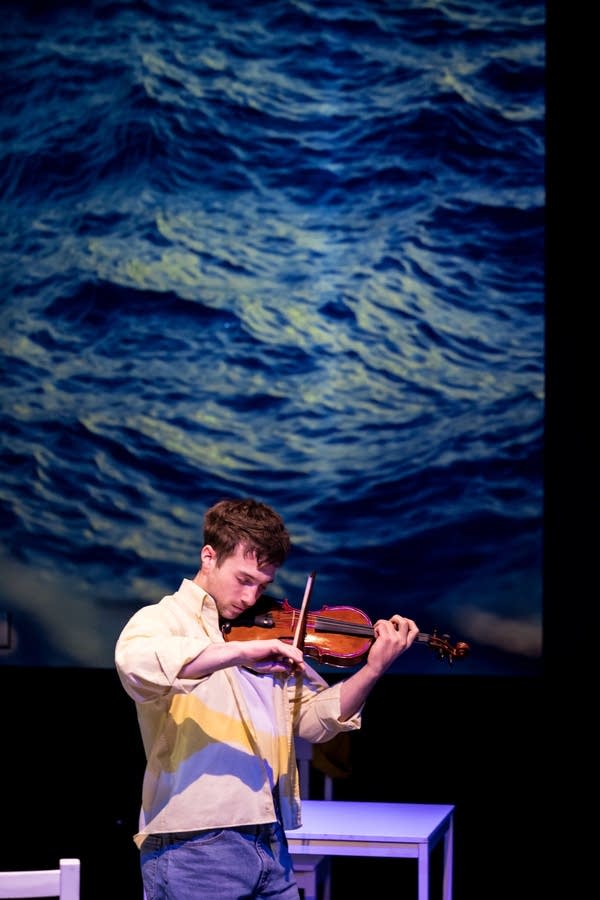 man playing instrument