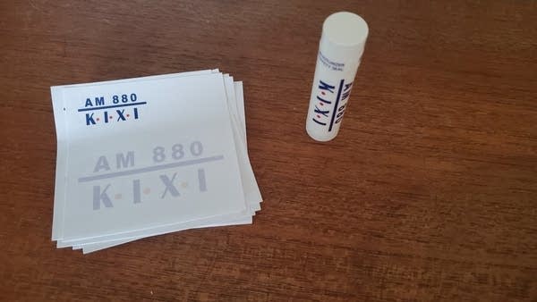 Photo of some KIXI-AM post-it notes & KIXI chapstick