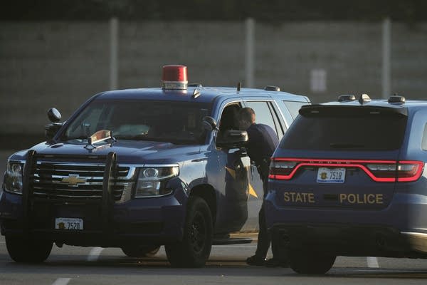 A man accused of stabbing 11 people at a Walmart is in Michigan authorities' custody