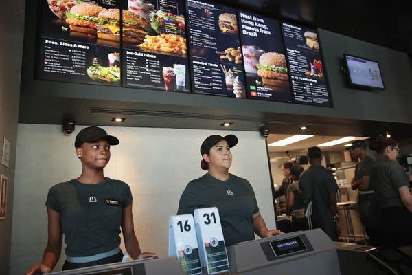 CHICAGO, IL - JUNE 04:  Employees work the counter at a McDonald's restaurant located inside the company's new corporate headquarters on June 4, 2018 in Chicago, Illinois.  McDonald's headquarters recently returned to the Chicago, which it left in 1971, from suburban Oak Brook. Approximately 2,000 people will work from the building.  