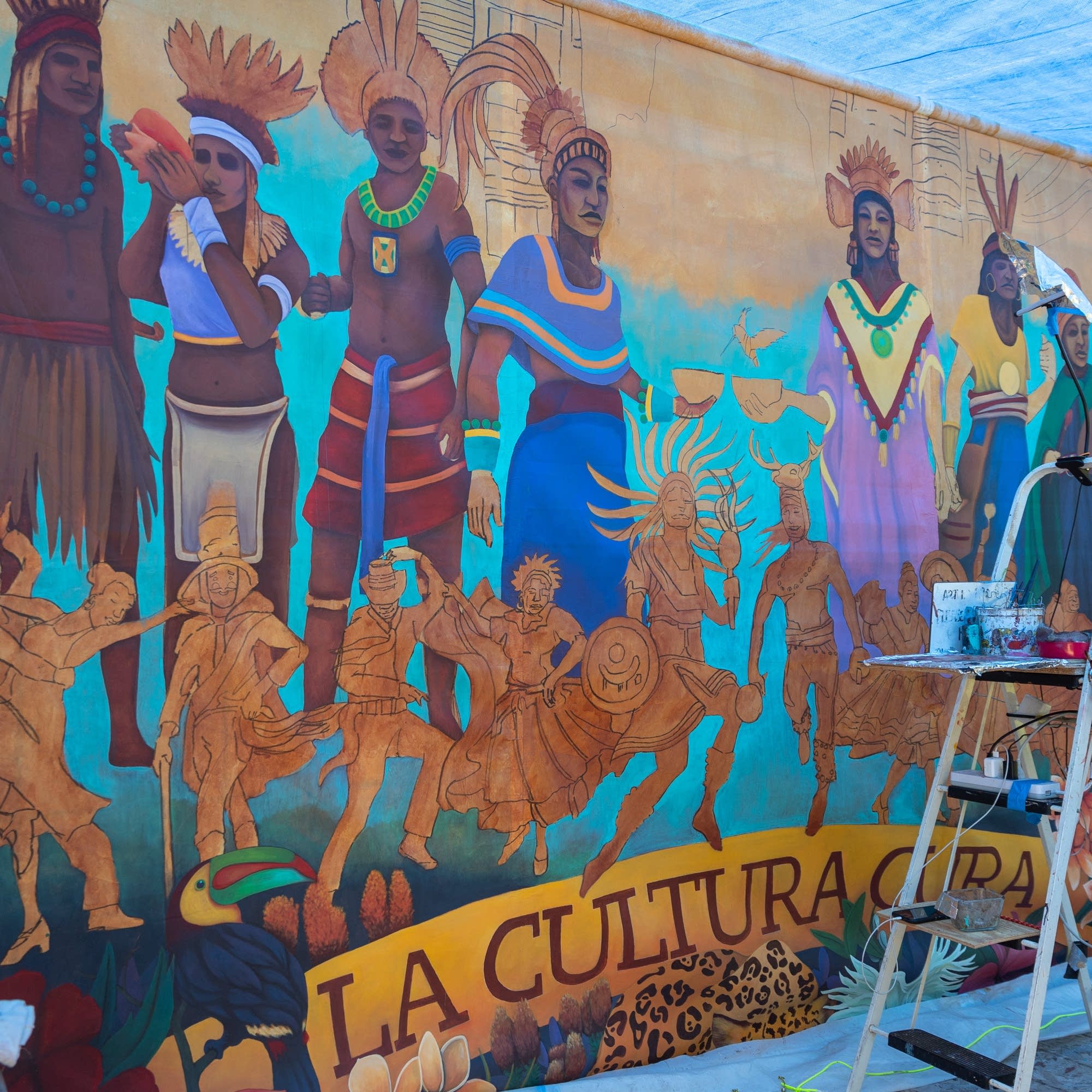 Muralist's latest work honors people of Latin American, Caribbean