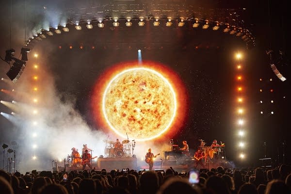 Brandi Carlile and band performing on stage
