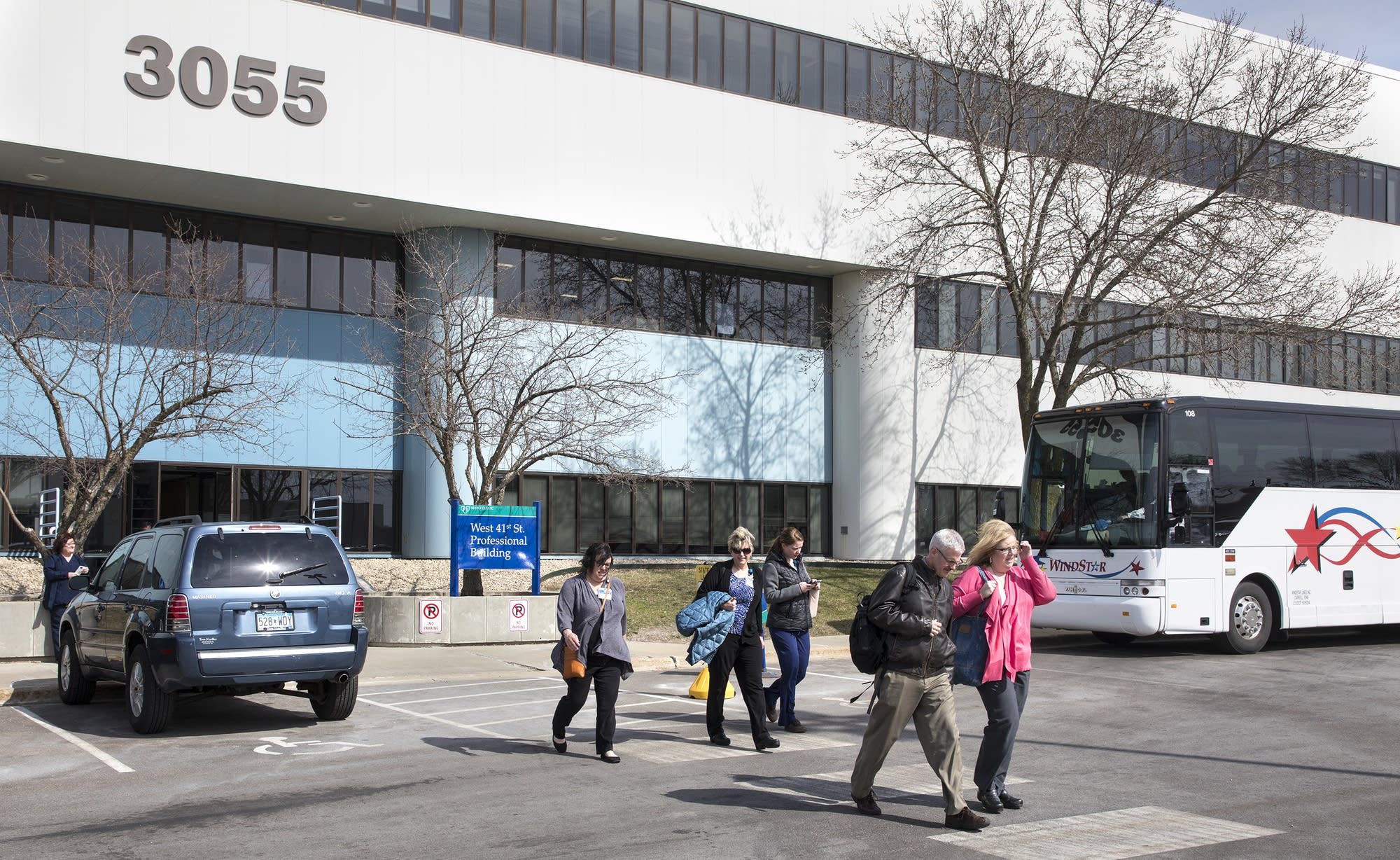 Mayo Clinic employees arrive and leave the Command Training Center.