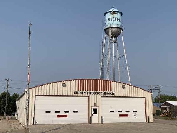 A water tower and a fire station