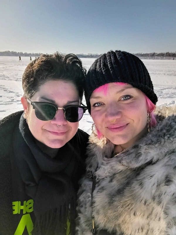 Two people pose for a photo