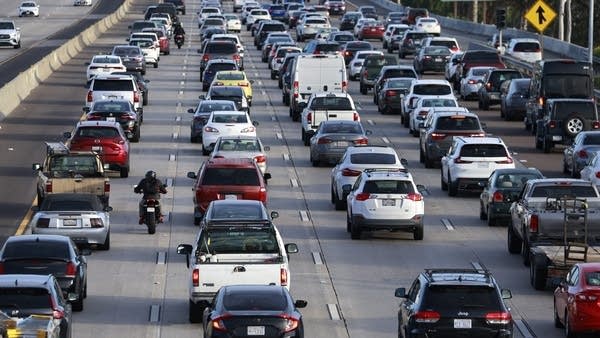 Biden administration announces $100 million in initiatives to ease the transition to EVs
