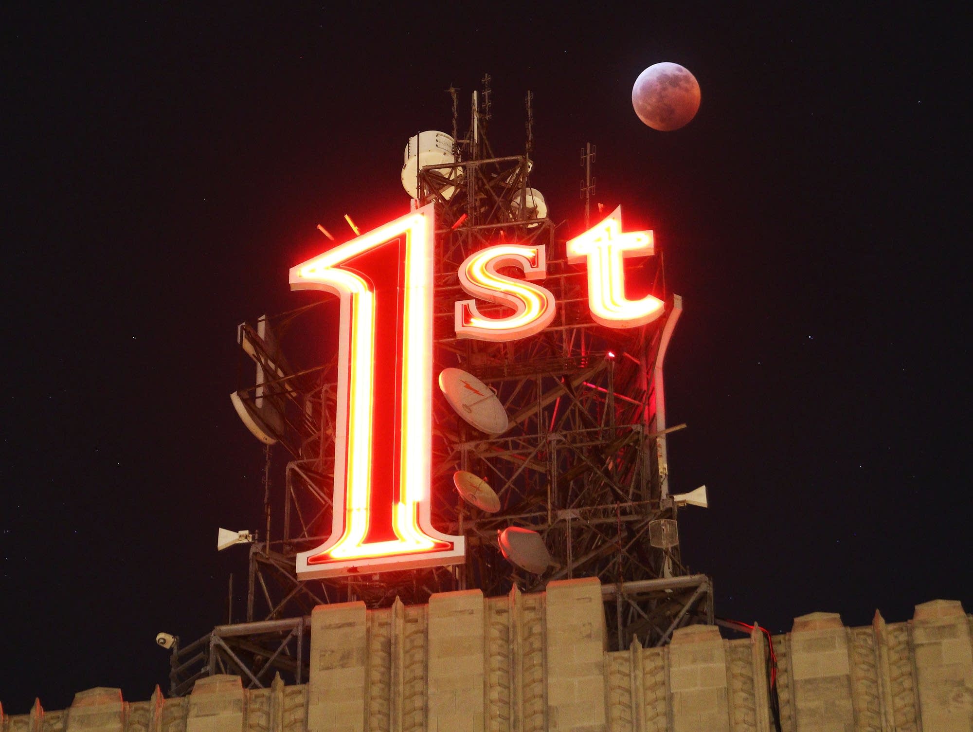 The super blood wolf moon is visible above St. Paul