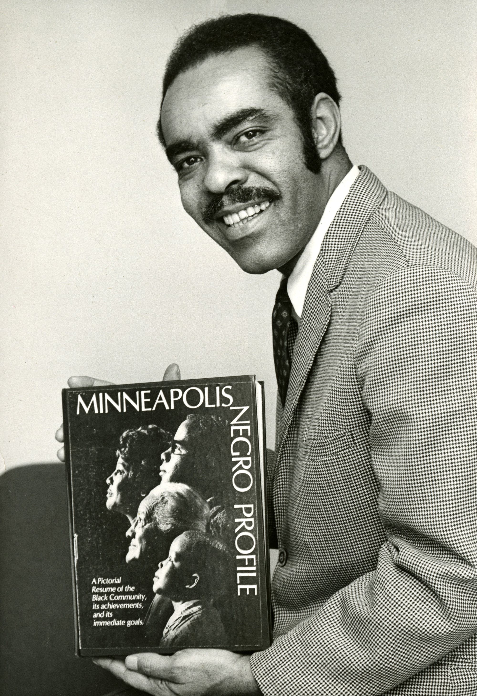 Walter Scott poses with his 1968 book,