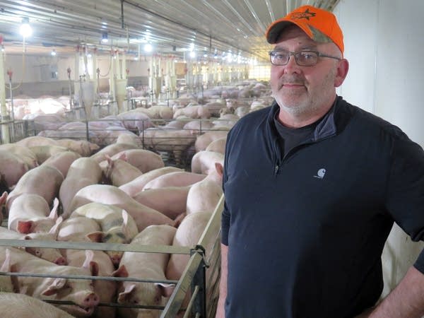 Hog producer Randy Spronk worries an exit from NAFTA would hurt farmers.