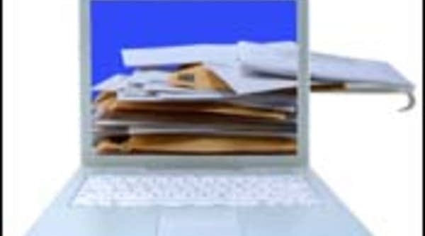 Letters in a computer with red mailbox flag