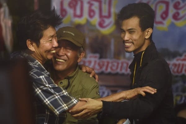Family members celebrate.