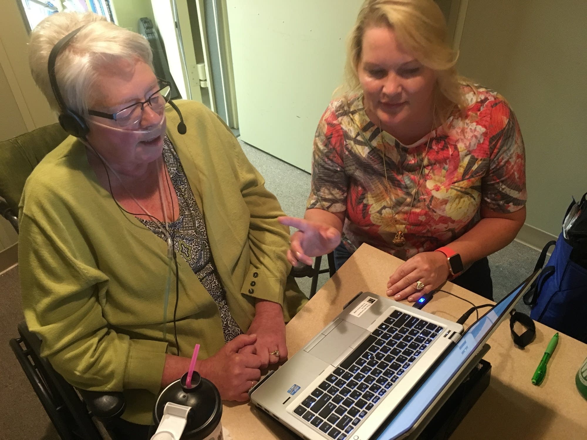 Judy Bernhardt records personalized messages in an audio booth.