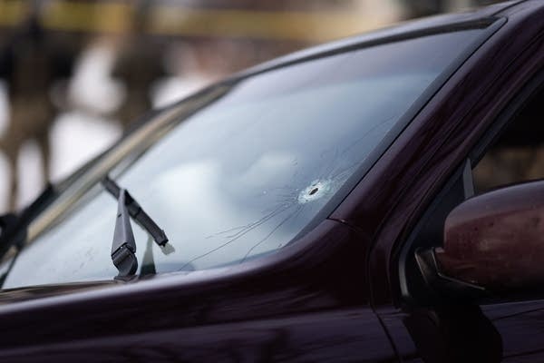 bullet hole in car window