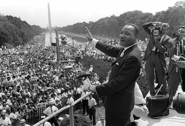 A man stands on a stage