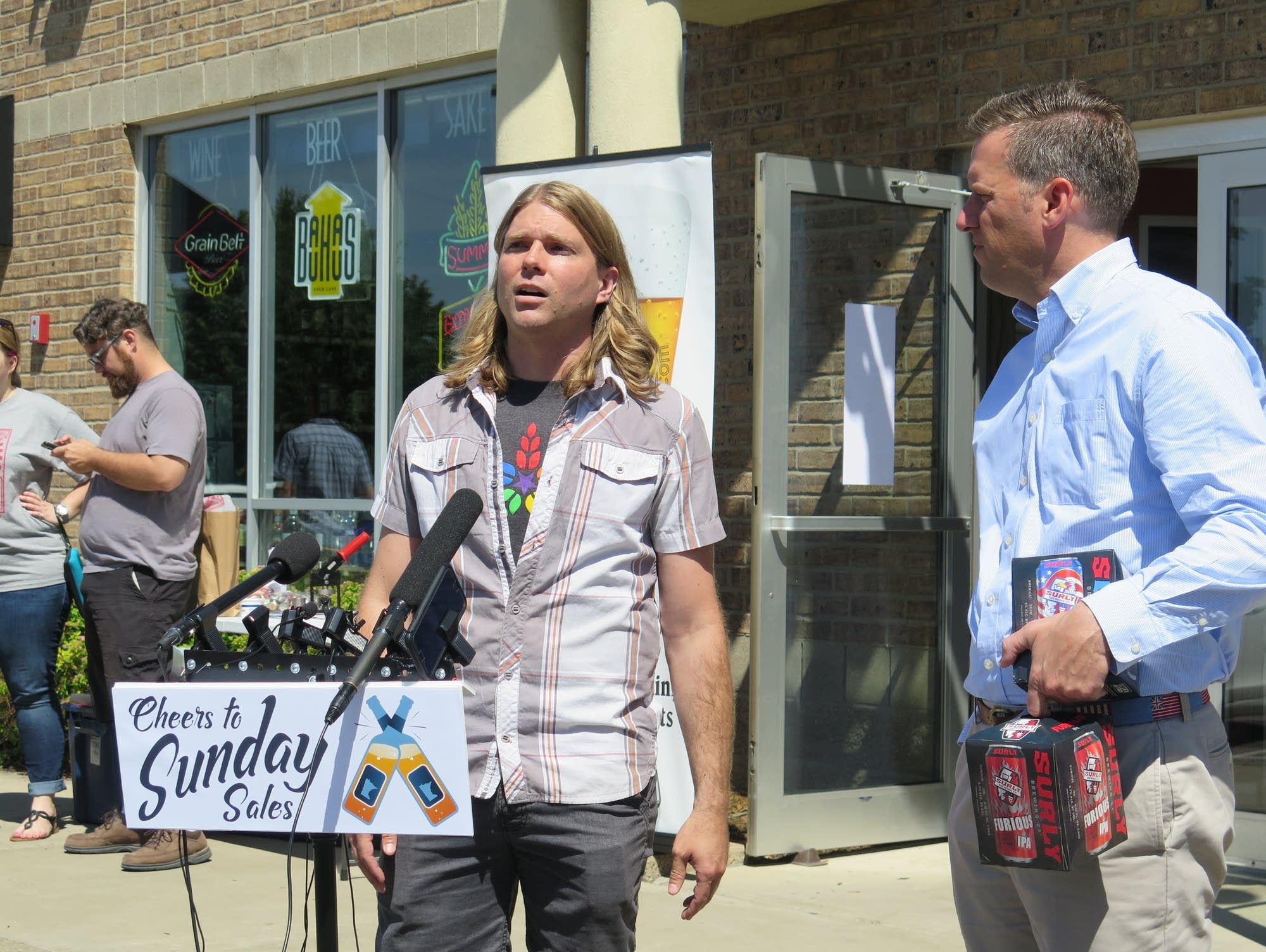 Metro retailers celebrate the start of legal Sunday sales.