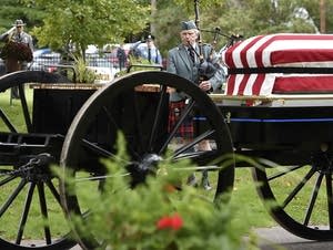 The caisson carrying the urn of corrections officer Joseph Parise.