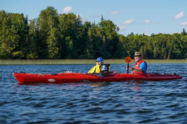 Pat Marble, who's turning 107 in August, kayaks on Island Lake in Northome