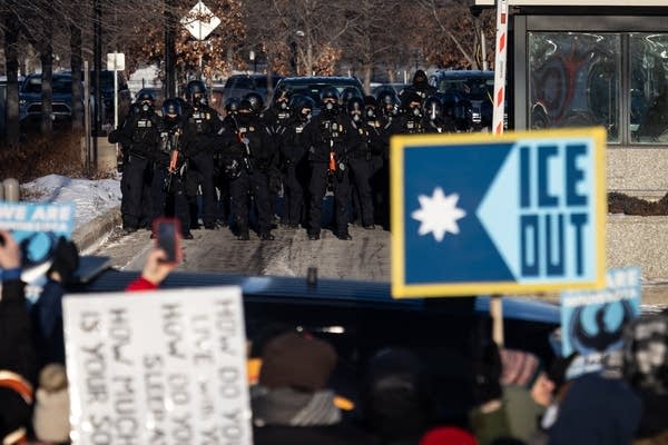 Faith leaders, protesters criticize arrests in march at Whipple building