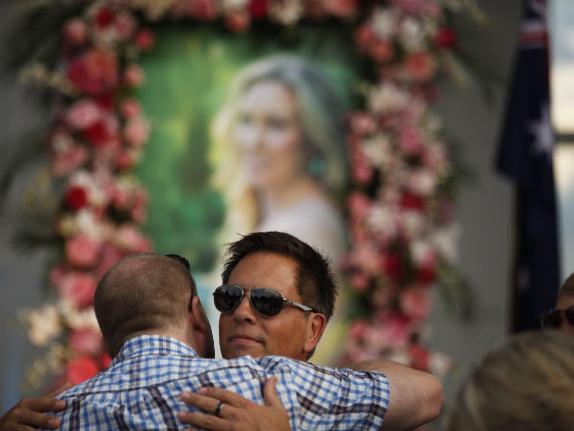 Don Damond hugs a friend.