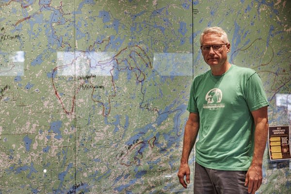Jason Zabokrtsky, owner of Ely Outfitting Co., poses