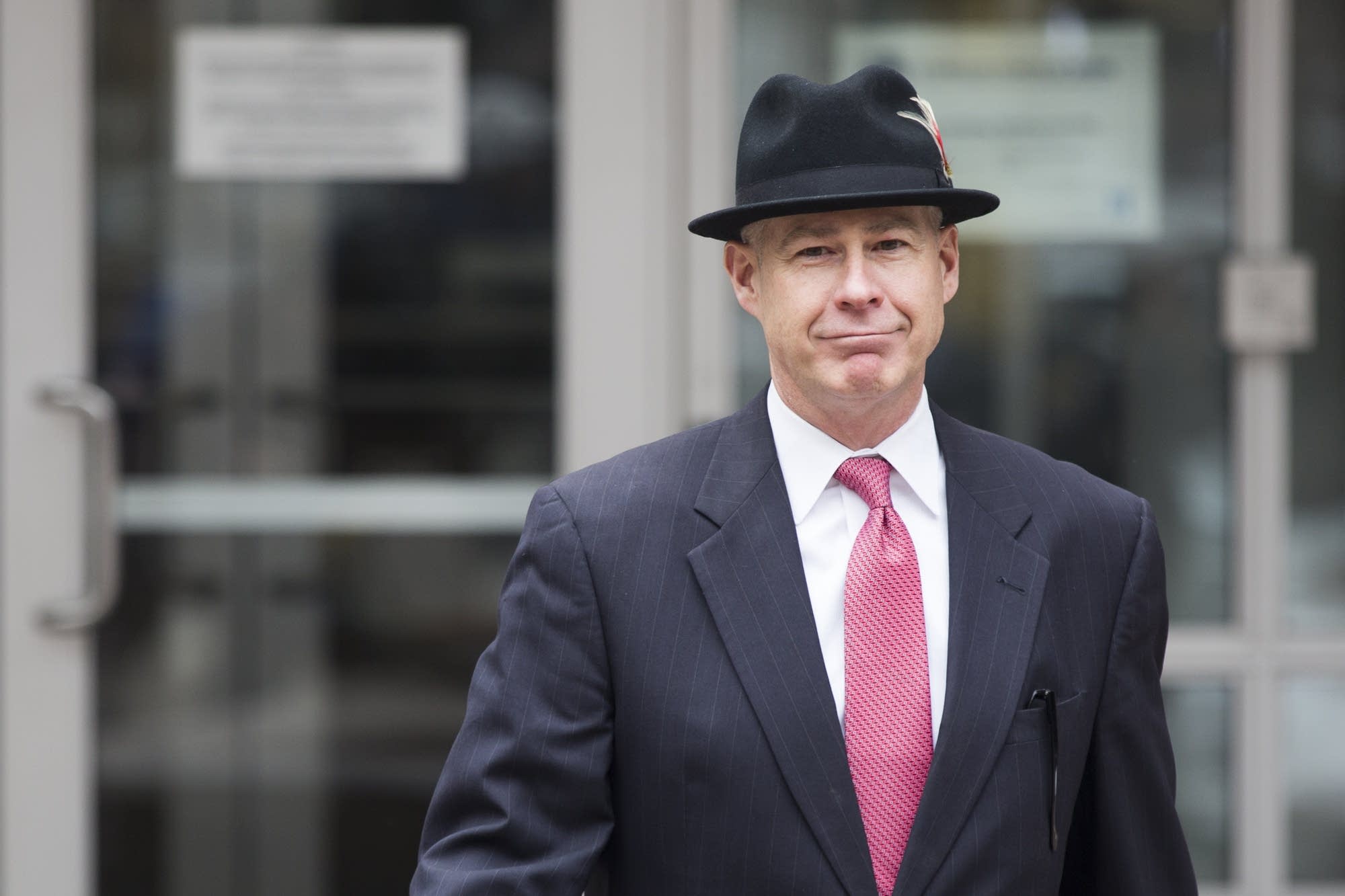 Attorney Thomas Plunkett leaves the Hennepin County Public Safety Facility.