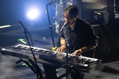 Alex G performing on stage