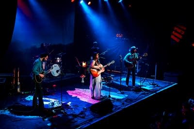 Margo Price and band performing on stage