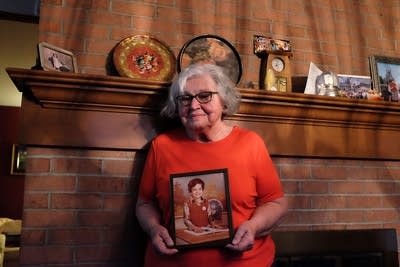 Spectacular Failures: Luella Kenny holds a photo of her late son, Jon. 