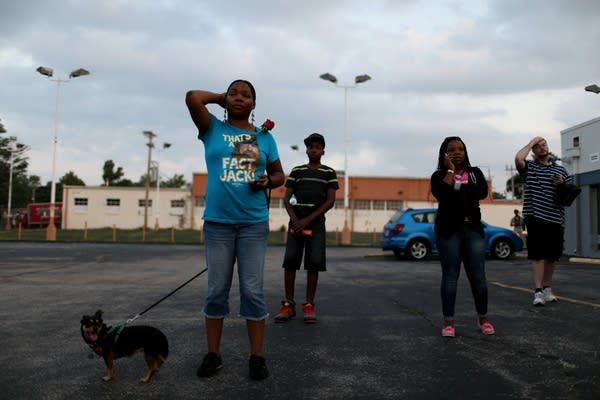 Demonstrators protest shooting death in Ferguson.