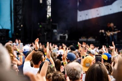 Crowd clapping and cheering