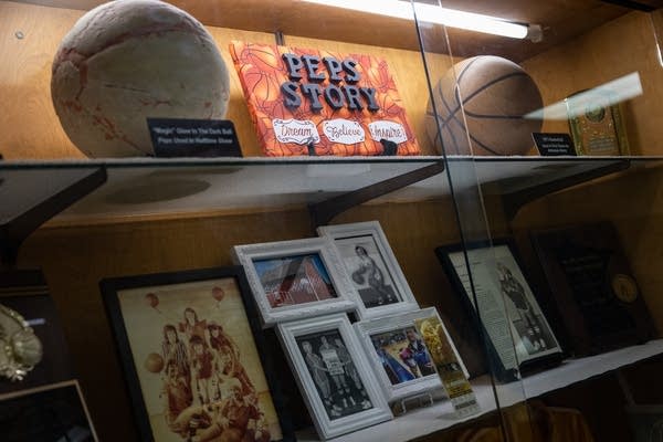 A display case of basketball memorabilia