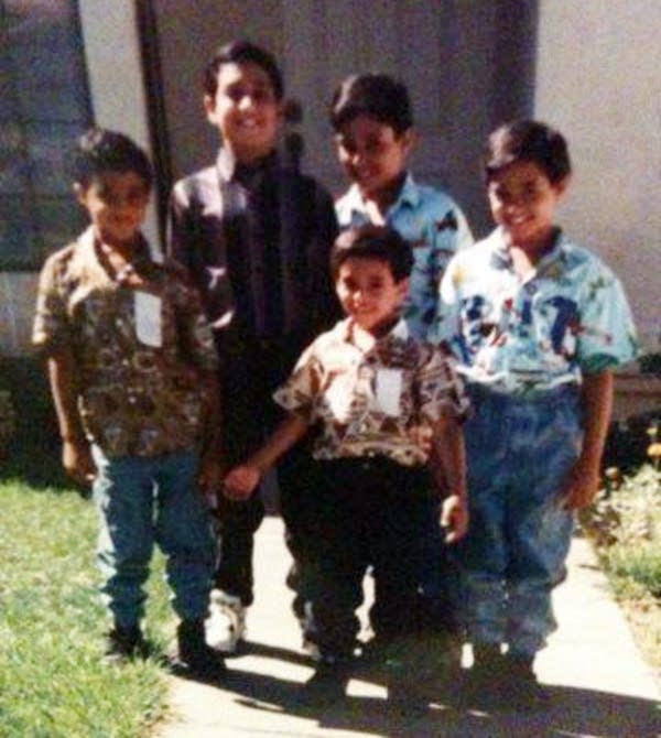 Tony Osman stood next to his cousin Amir Meshal.